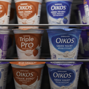 Oikos Greek Yogurt varieties in a fridge close-up