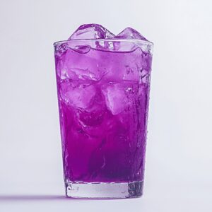 view of Purple Rain cocktail on white surface
